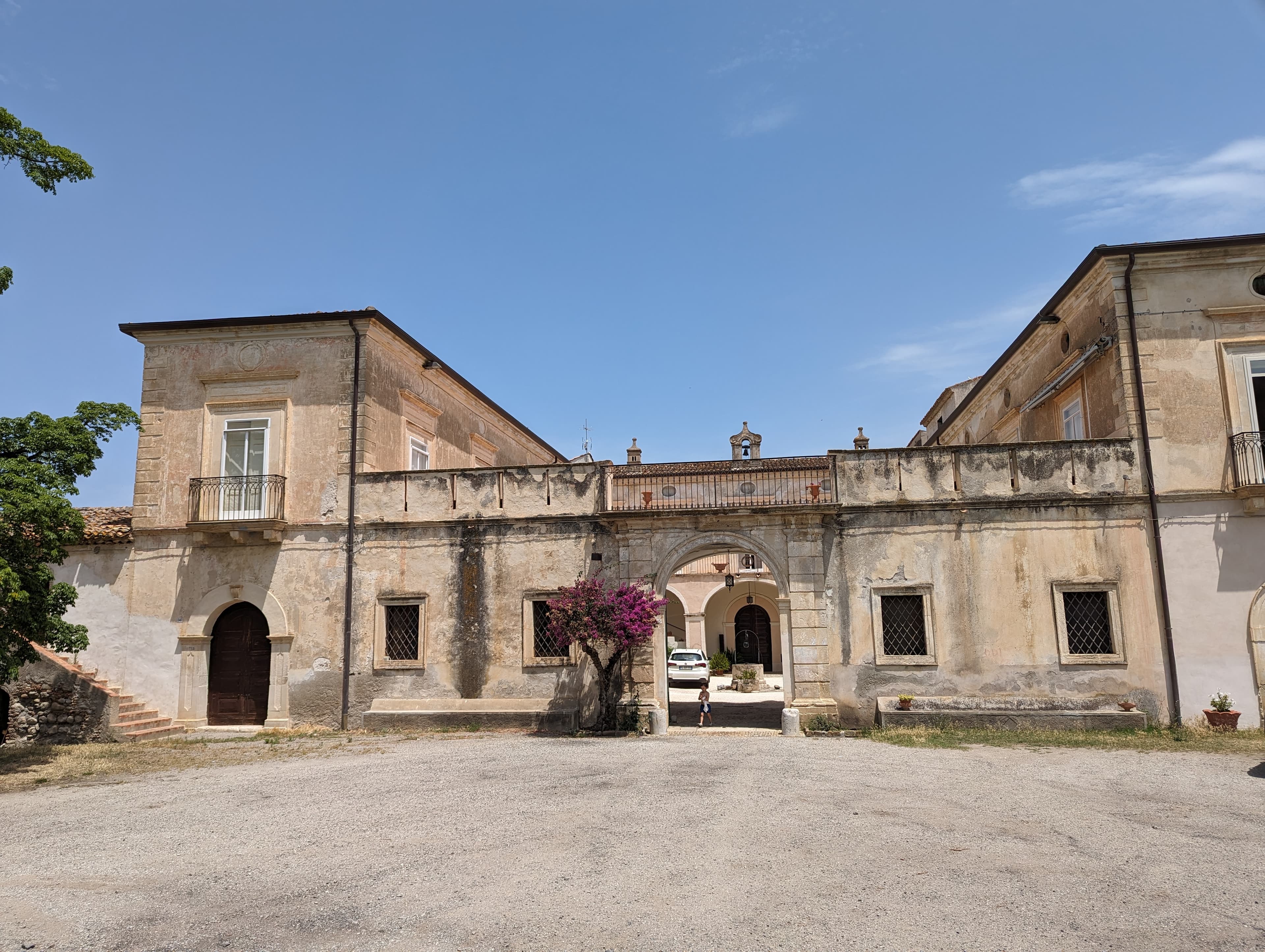 12th century castle exterior with stone walls and Mediterranean architecture